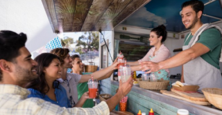 People ordering at a food truck